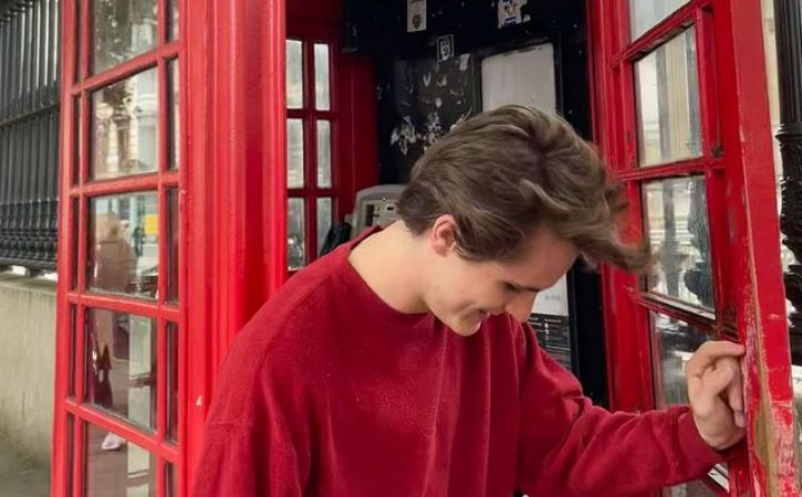 Wil Deusner in red shirt in London